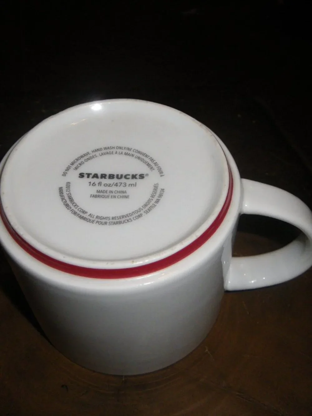 2012 Starbucks 16 oz. Coffee Mug Classic White Red Rim Bottom Gold Lettering
